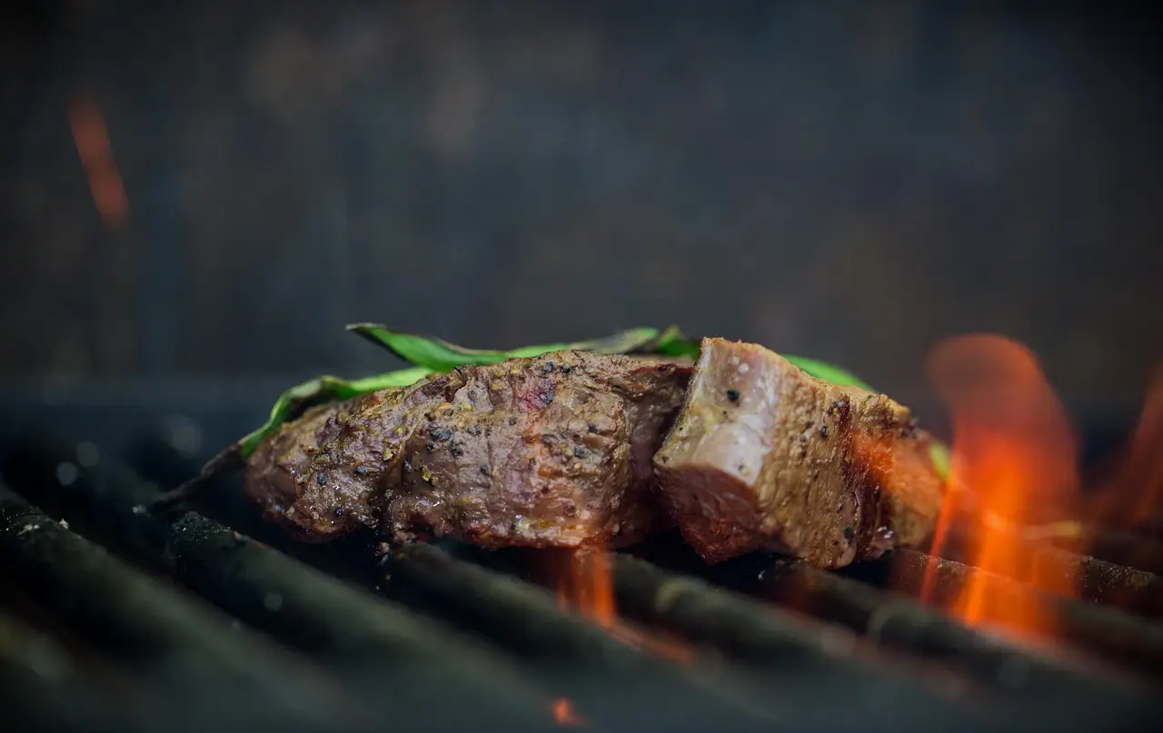 Chef cooking over open flames
